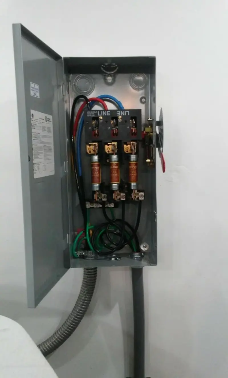 Three-phase disconnect switch installed for Smoke Detector Installation in Port St. John